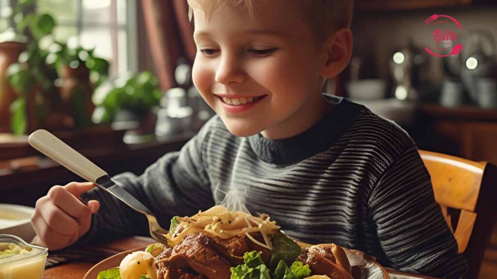 A smiling child sits at a dining table, eagerly holding a fork above a plate of pasta and greens. Sunlight and plants create a warm, inviting atmosphere.